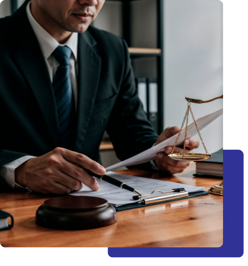 2 personal injury lawyer Lawyer reviewing legal documents with gavel and scales.