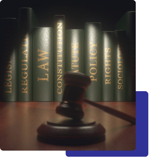 4 personal injury lawyer Gavel in front of a row of law books.