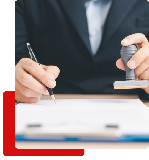 5 personal injury lawyer Legal professional signing and stamping a document.
