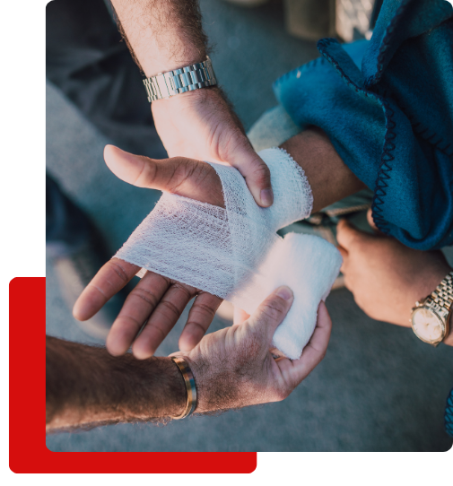 Insurance Disputes image 1 media wrapping injured hand at scene